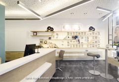 Moderne Brillenhalter in Ebersberg Framedock Brill